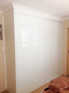 Built in robe with white opti glass doors